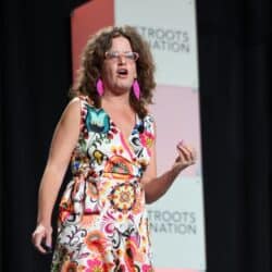 Anat Shenker-Osorio speaking on a stage.