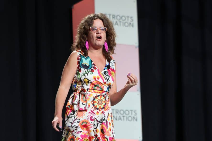 Anat Shenker-Osorio speaking on a stage.