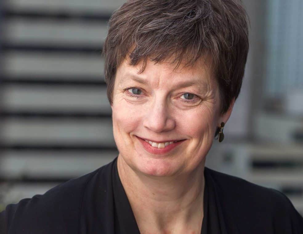 Margaret Mason with short hair smiling