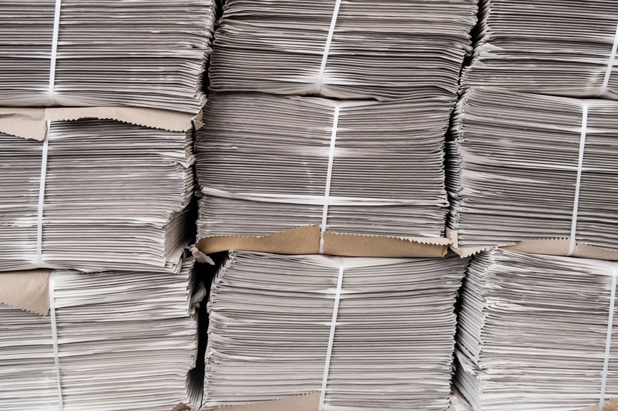 Stacks of newspapers ready to be sold