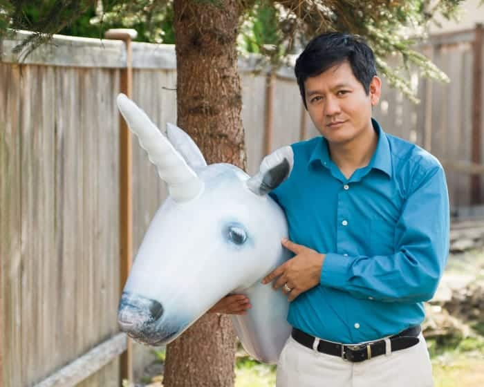 Photo of Vu Le with a unicorn head
